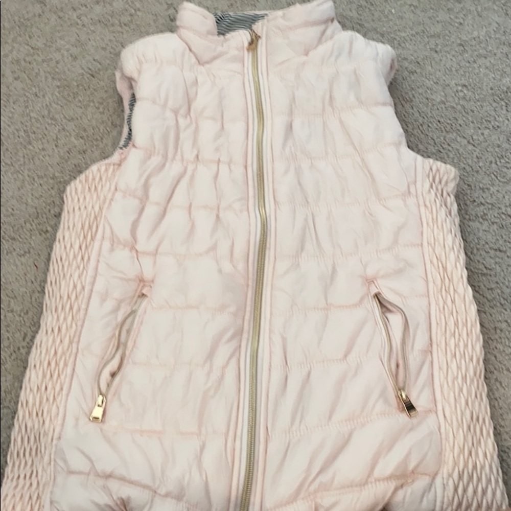 baby pink vest with gold zippers & striped inside